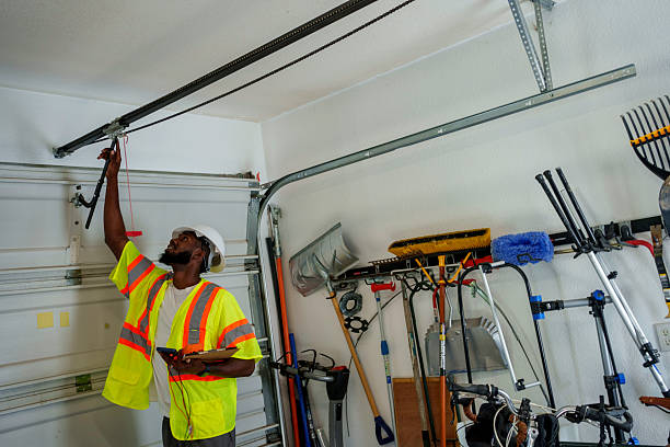 Professional Garage Door Panel Replacement technician working in Hinds County County, MS